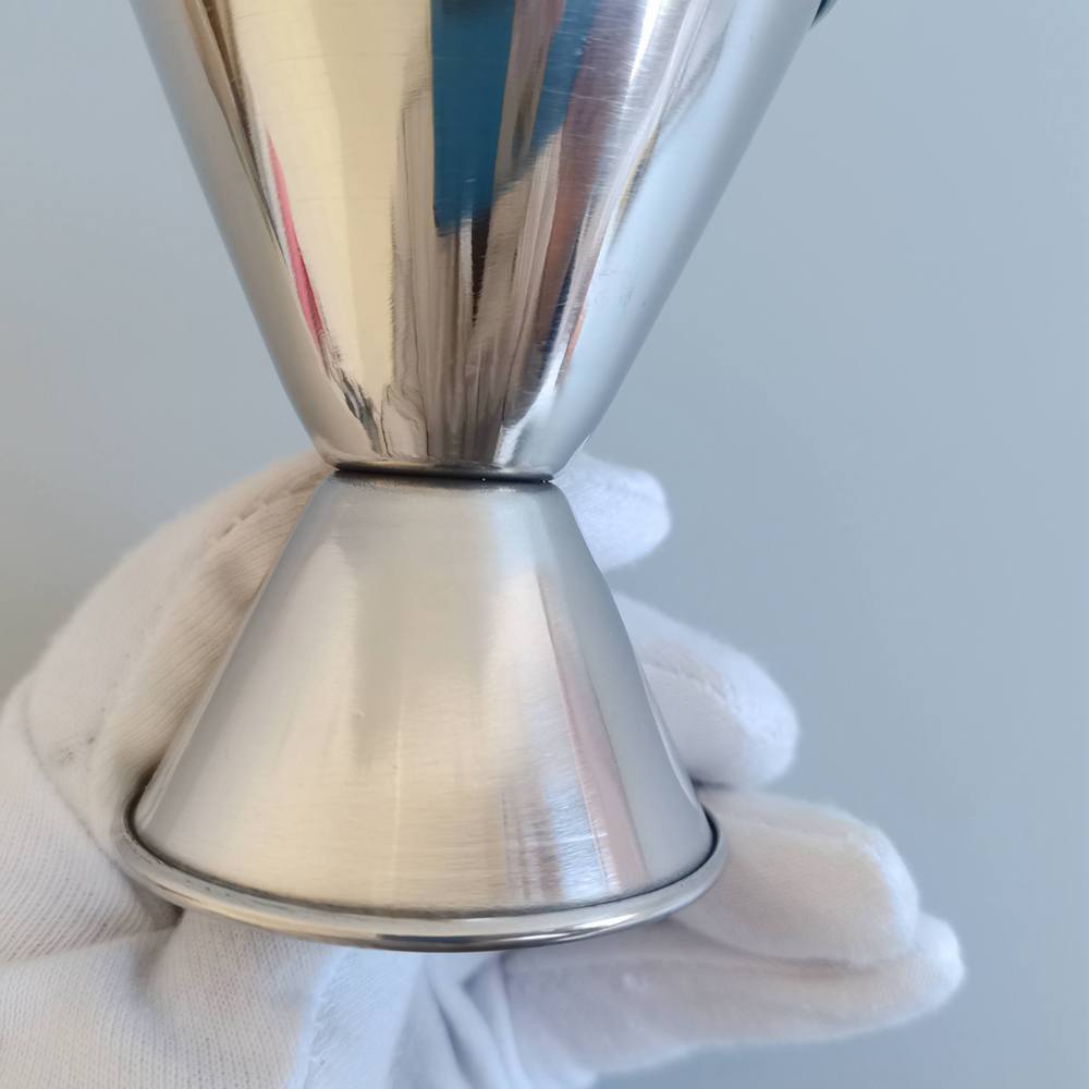LARBO stainless steel Japanese jigger top cone detail showing polished finish