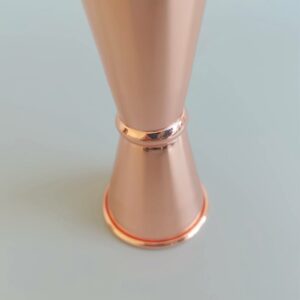 IMG_20221223_104250 LARBO rose gold plated double-sided jigger detail showing polished mirror finish