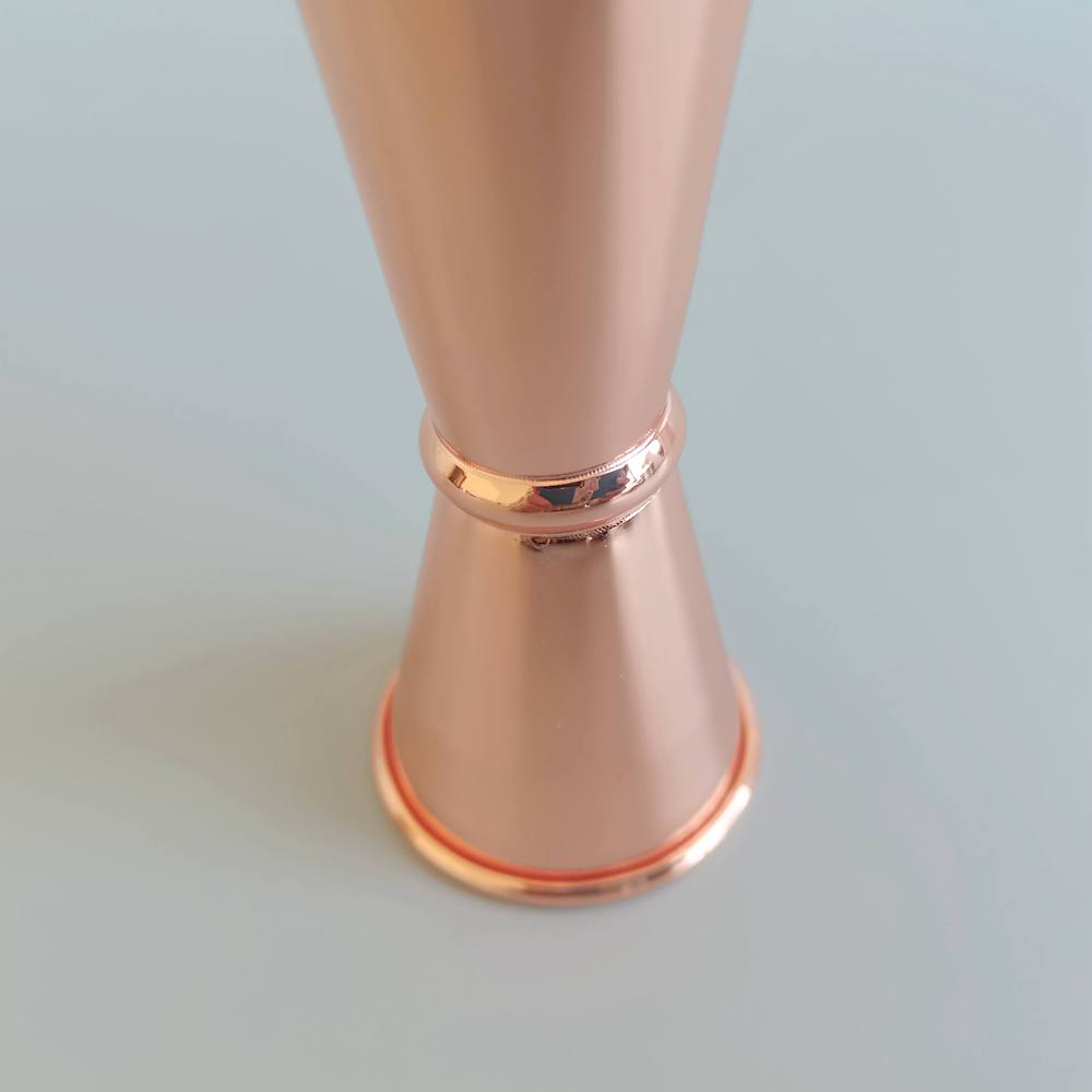 LARBO rose gold plated double-sided jigger detail showing polished mirror finish